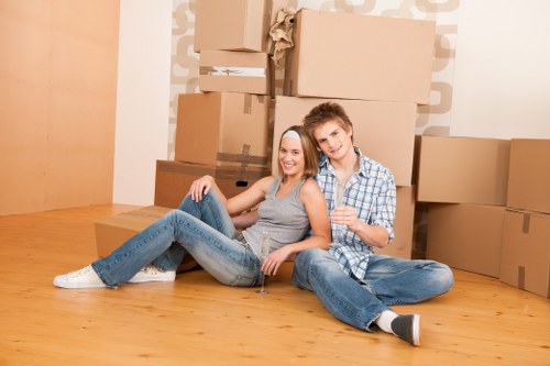 Local Sutton removals team helping with furniture loading