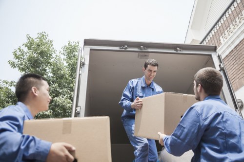 Packed moving boxes and furniture for Sutton removals