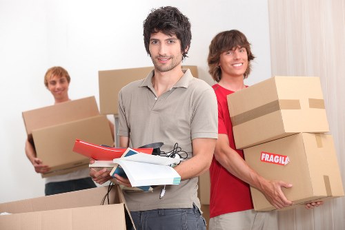 Packed moving boxes ready for a Sutton home removal