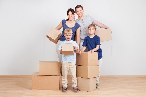 Packed boxes and furniture ready for a Sutton house removal