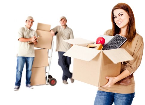 Careful loading of furniture into a van during a Sutton move