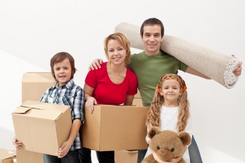 Local moving team handling boxes near Sutton properties