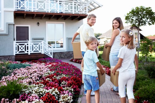 Boxes and furniture prepared for a man and van service in Sutton