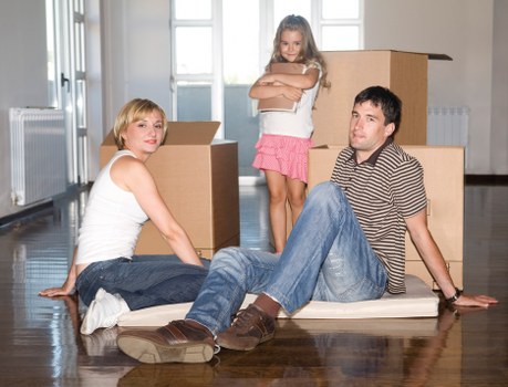 Professional mover assisting a household relocation in Sutton